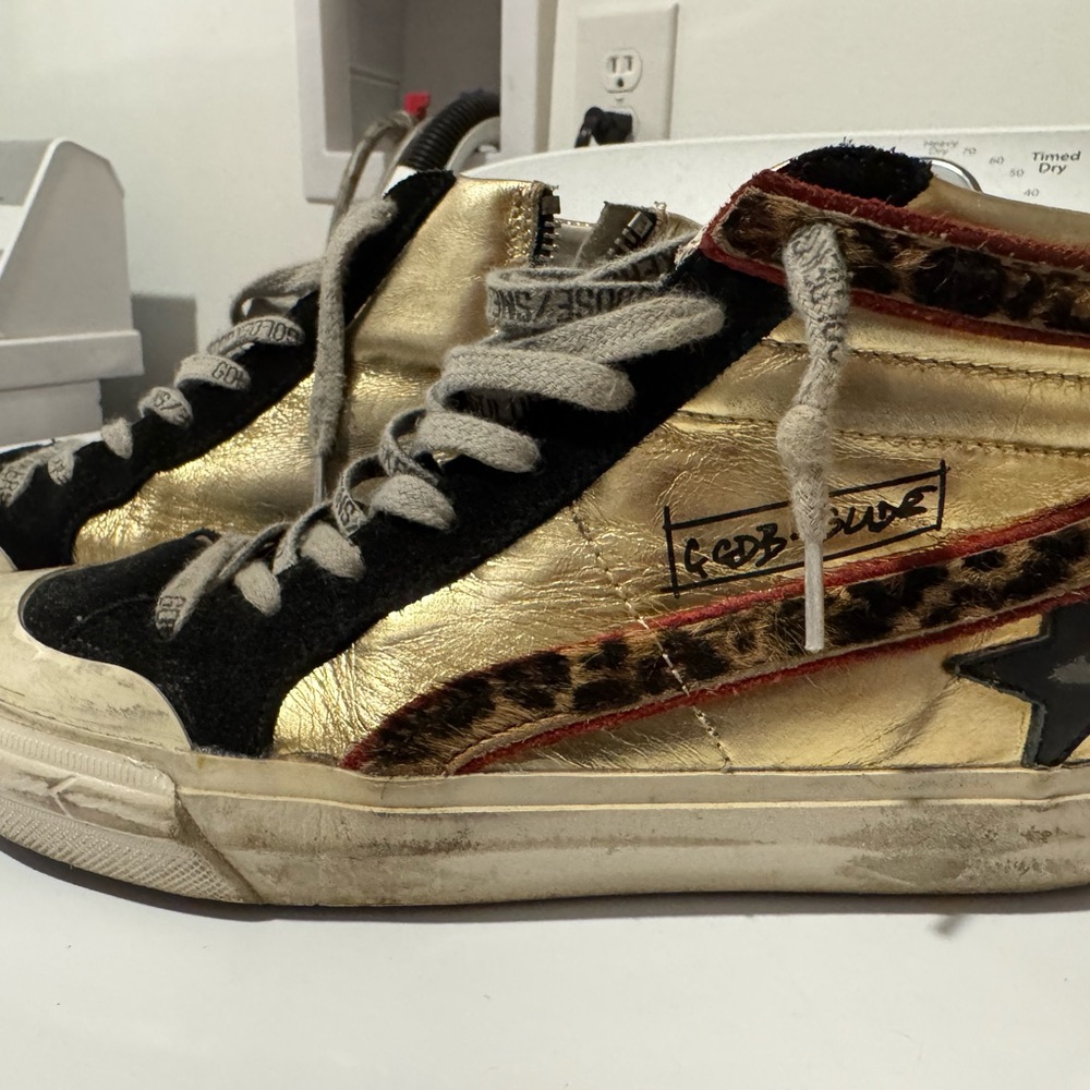 Golden Goose Metallic Gold and Black Sneakers